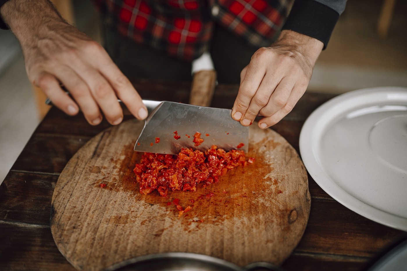 A chef working with fresh, local vegetables — the heart of farm-to-table.